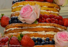 Wedding cake with fresh wedding flowers